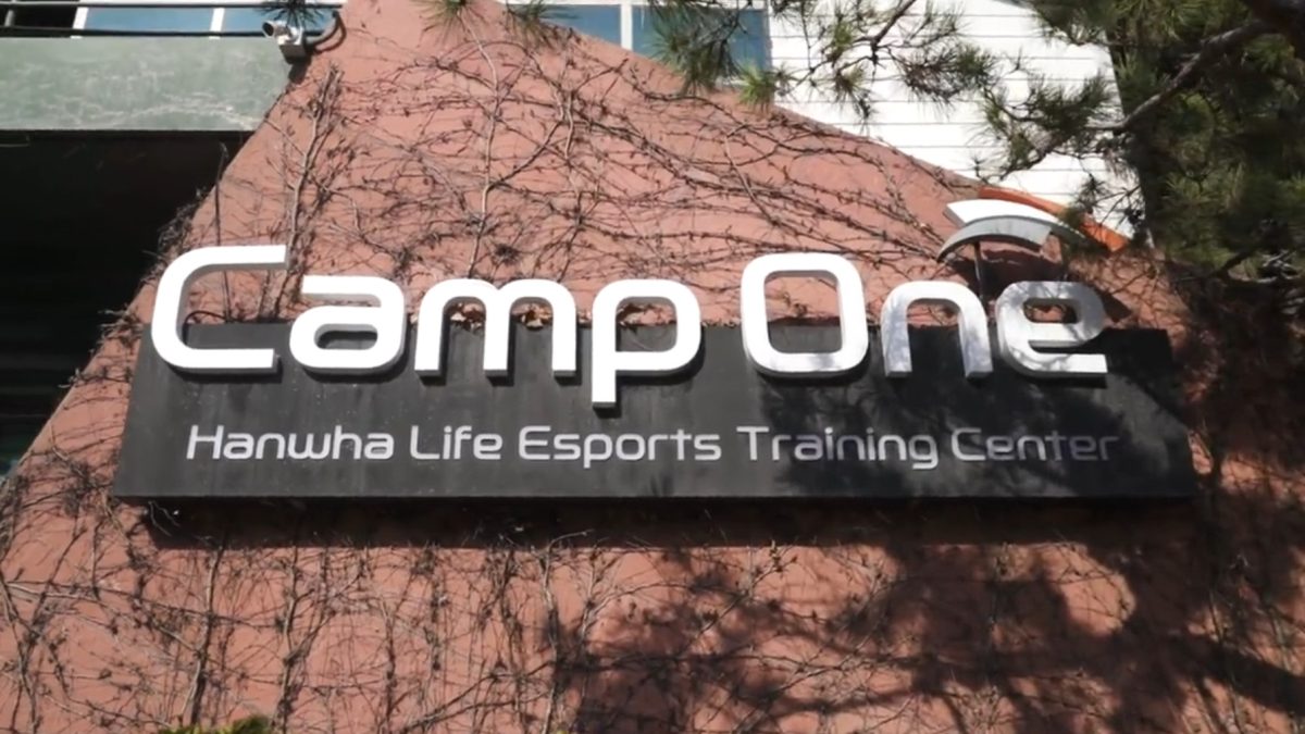 Image shows a sign that reads Camp One Hanwha Life Esports Training Center