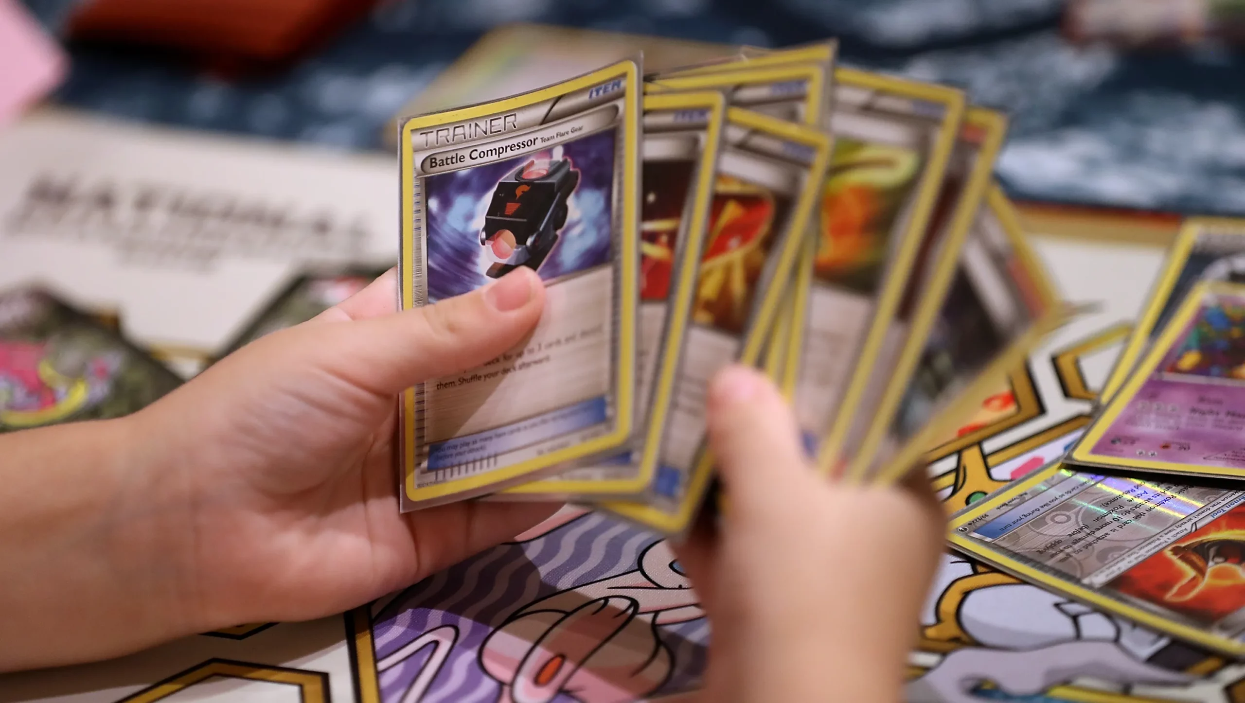 Featured image for “Kansas police officer loses job after trying to steal $400 worth of Pokemon cards”