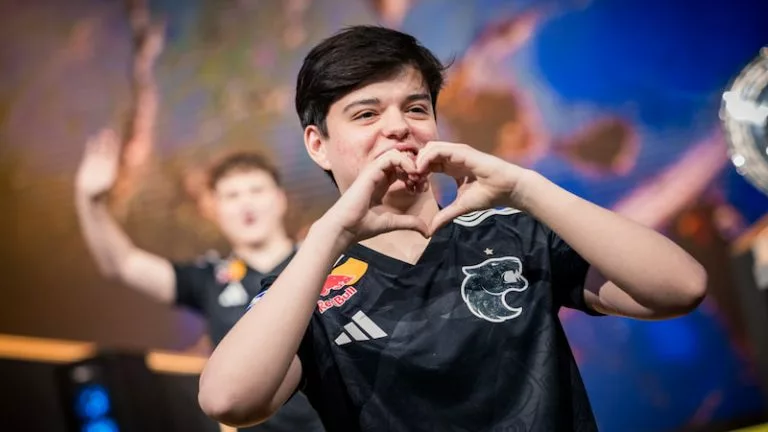 molodoy makes a heart sign with his hands toward the IEM Chengdu 2025 crowd.